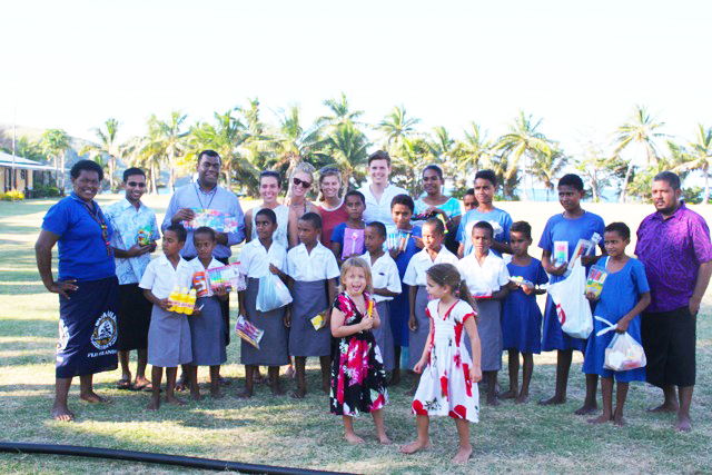 Children on Island Receiving Supplies