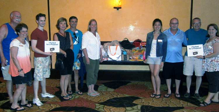 Senn Delaney employees with supplies