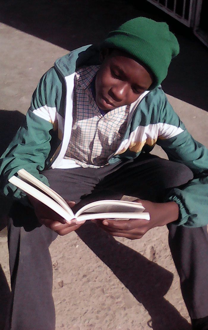 Boy reading book